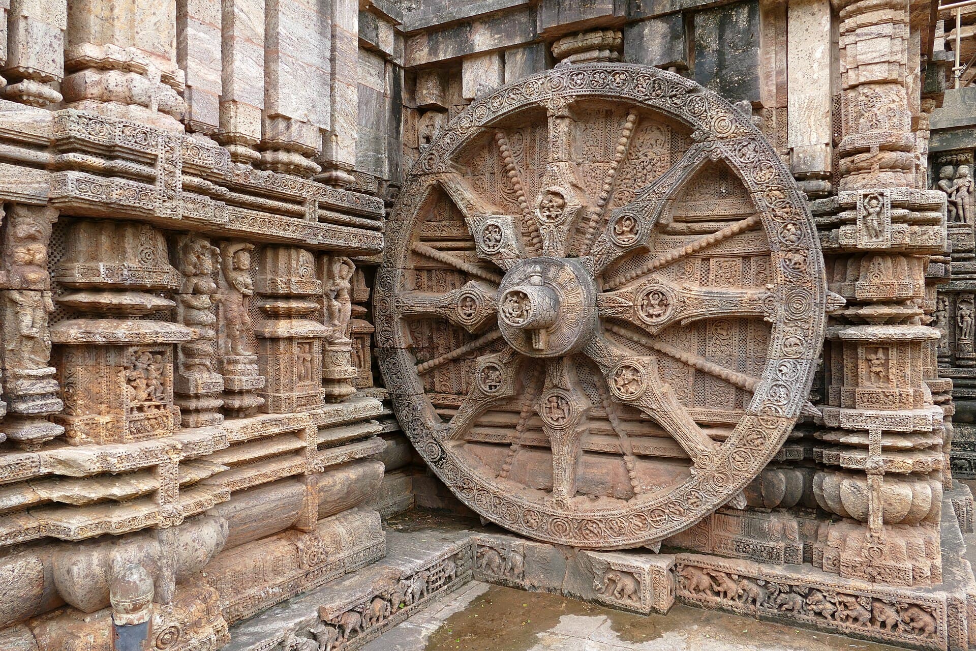 A carved stone chariot wheel at the Konark Sun Temple