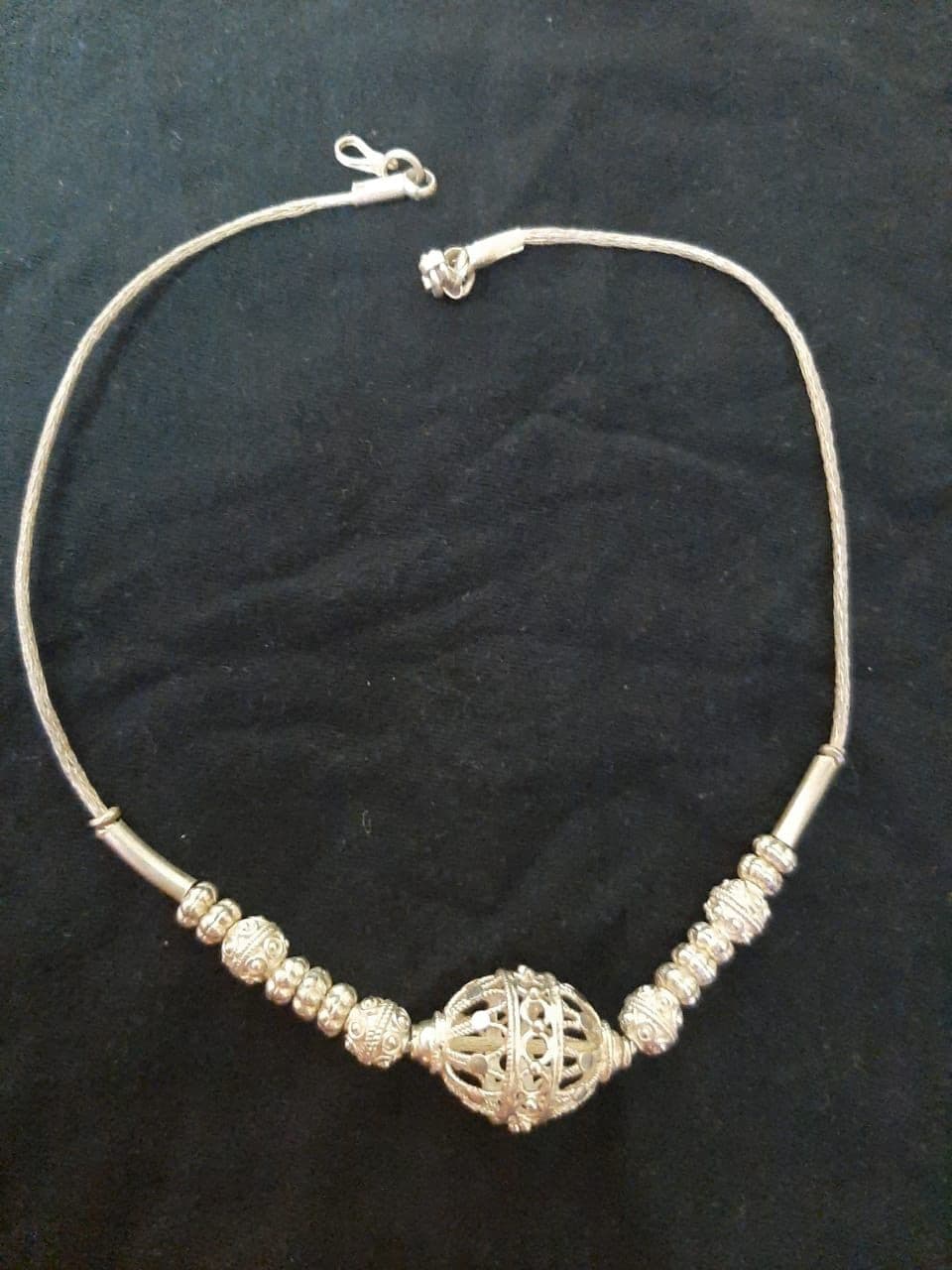 A traditional tarakasi silver filigree necklace from Odisha